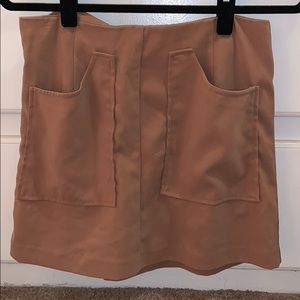 Tan skirt. 70s vibes